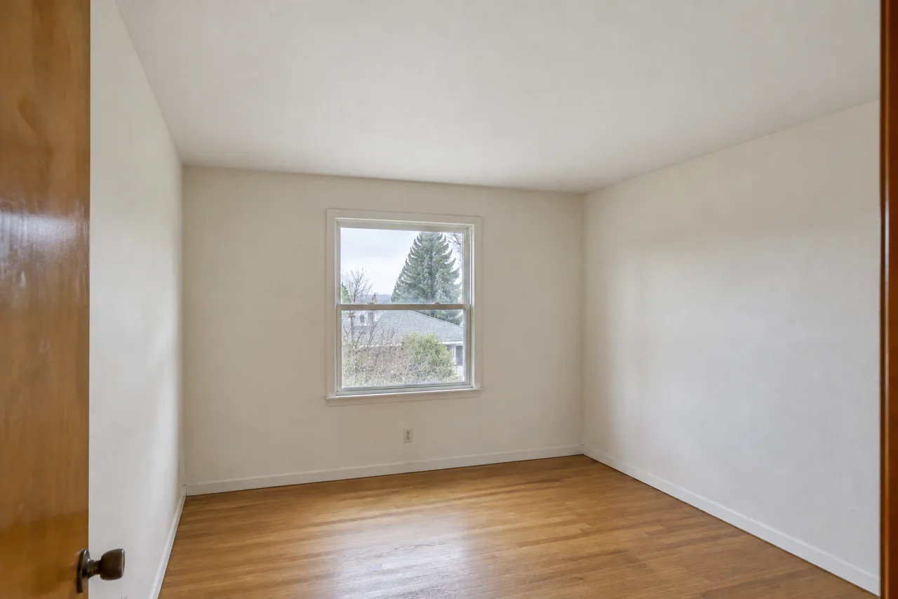 The same room with a smooth ceiling finish.